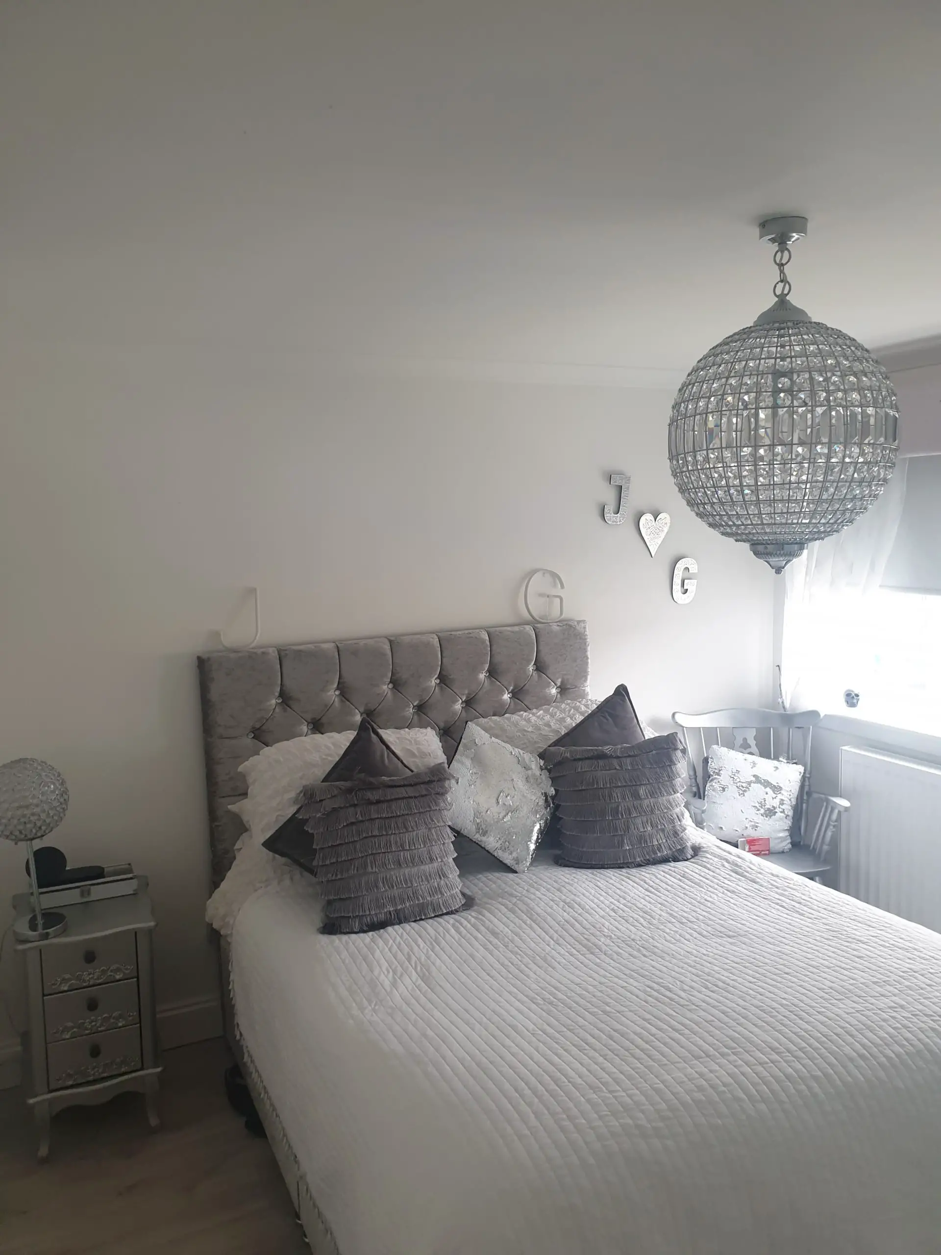 Bright Natural Light in Gray and White Bedroom