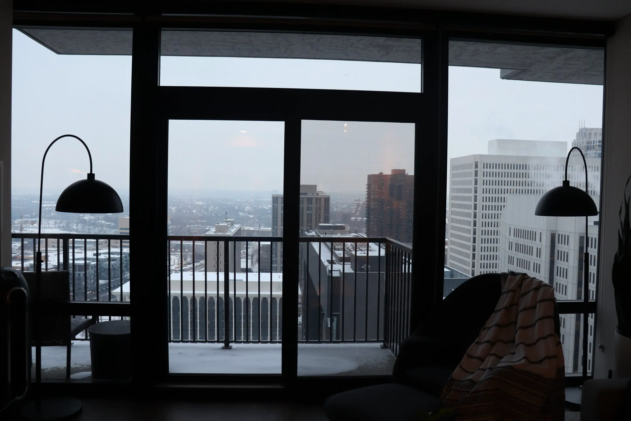 High Rise Luxury Apartment Floor to Ceiling Windows Downtown Living Room