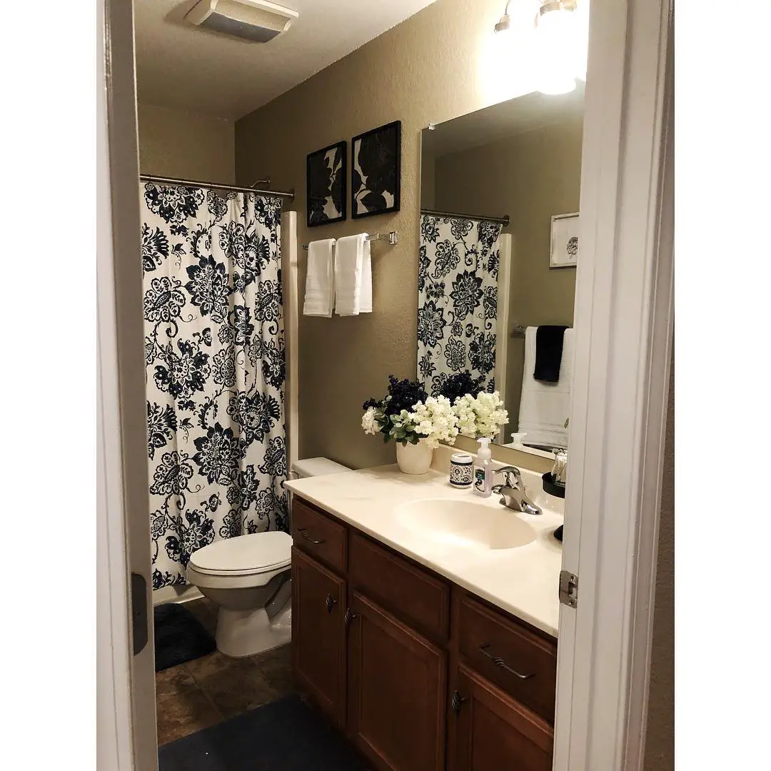 Clean White and Navy Bathroom with Flowers