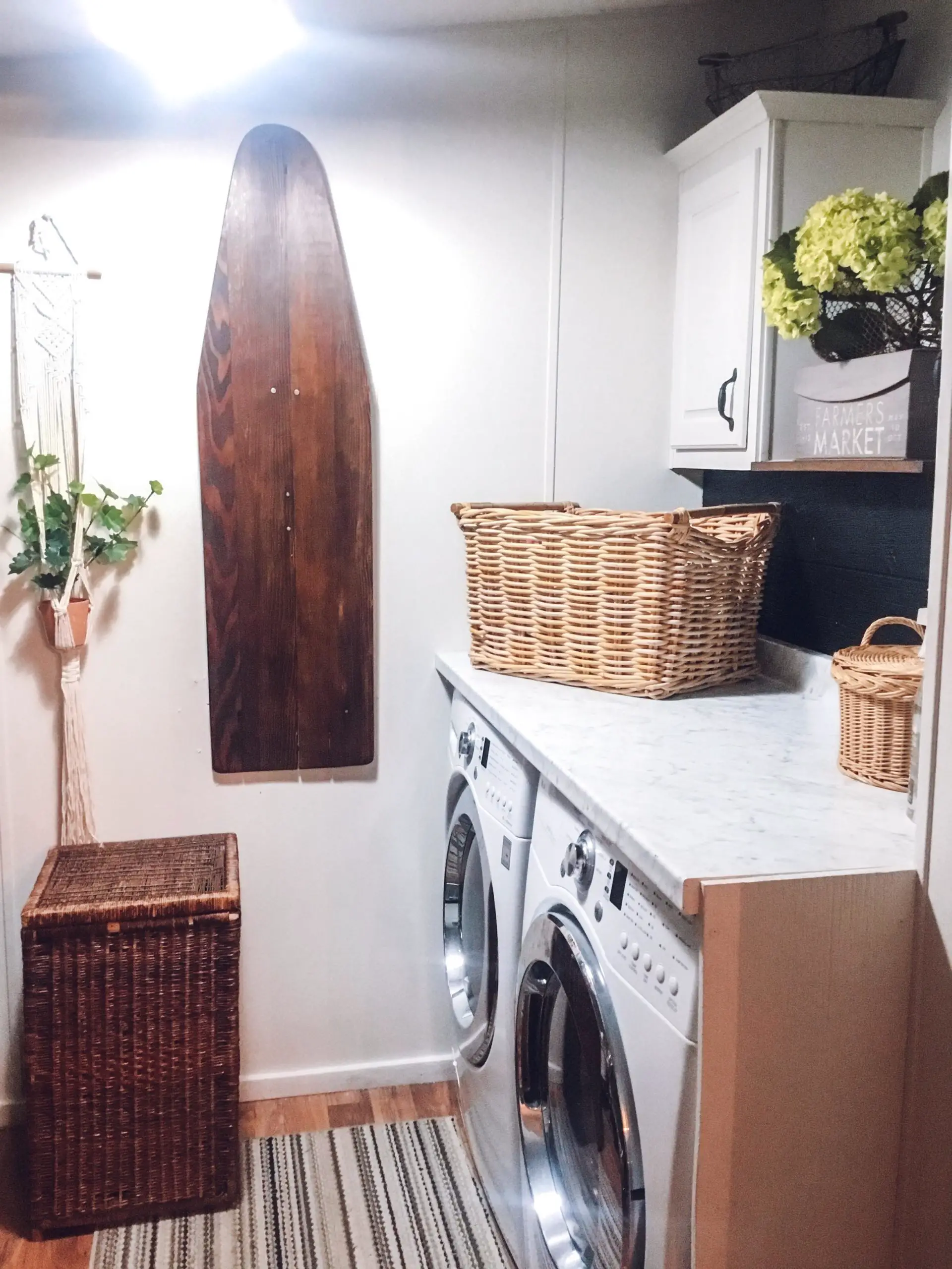 Laundry Basket with Matching Ironing Board in Wash Room